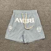 AMIRI Logo-Print Swim Shorts